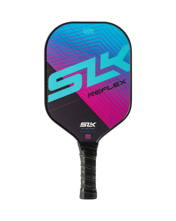 Pickleball paddle with cyan and magenta geometric design, large 'SLK' and 'REFLEX' logos and small 'USA' near handle.
