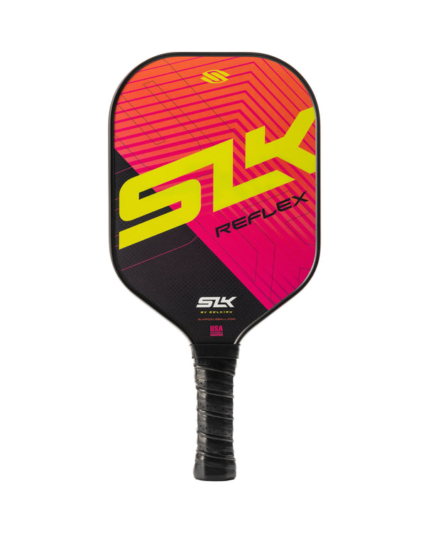 Pickleball paddle with neon yellow 'SLK' on pink geometric face, model name 'REFLEX' and small 'SLK' and 'USA' near the handle.