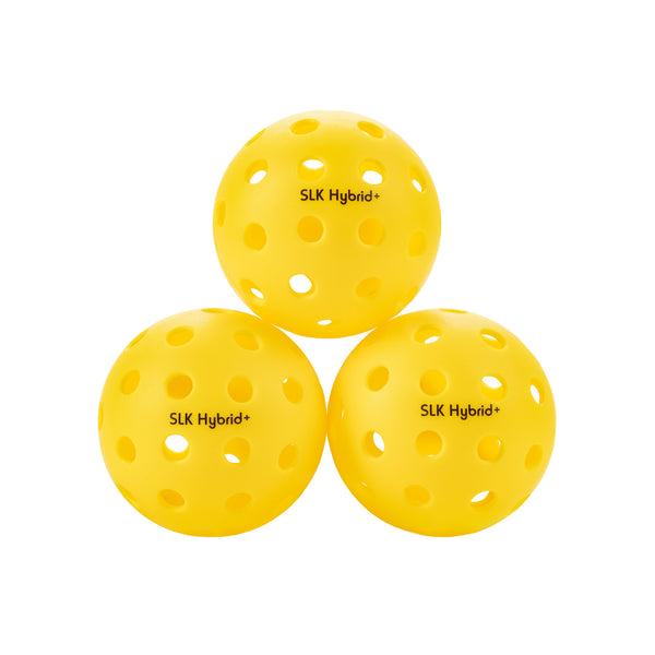 Three yellow practice balls with round holes, each labeled SLK Hybrid+, arranged in a triangle.