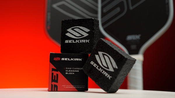 Selkirk pickleball Raw Carbon Fiber Cleaning Block with packaging, designed for paddle maintenance.